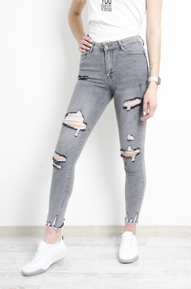 SPODNIE JEANSOWE SZARE PUSH UP Z SZARPANIAMI