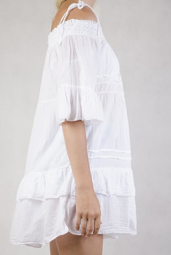 Biała tunika z falbanami i hiszpańskim dekoltem