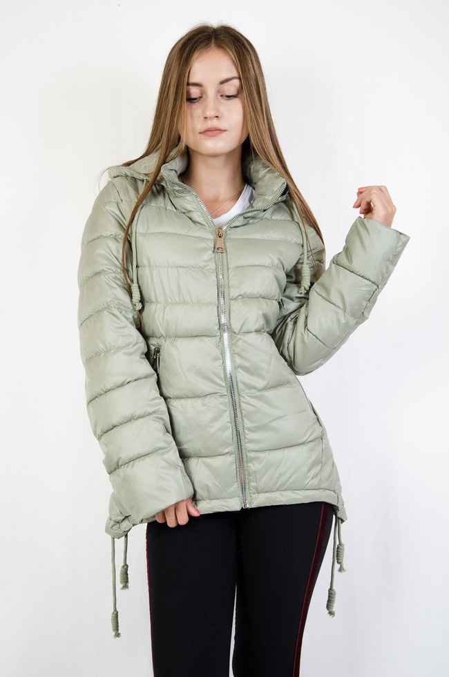 Zielona pikowana kurtka z asymetrycznymi bokami
