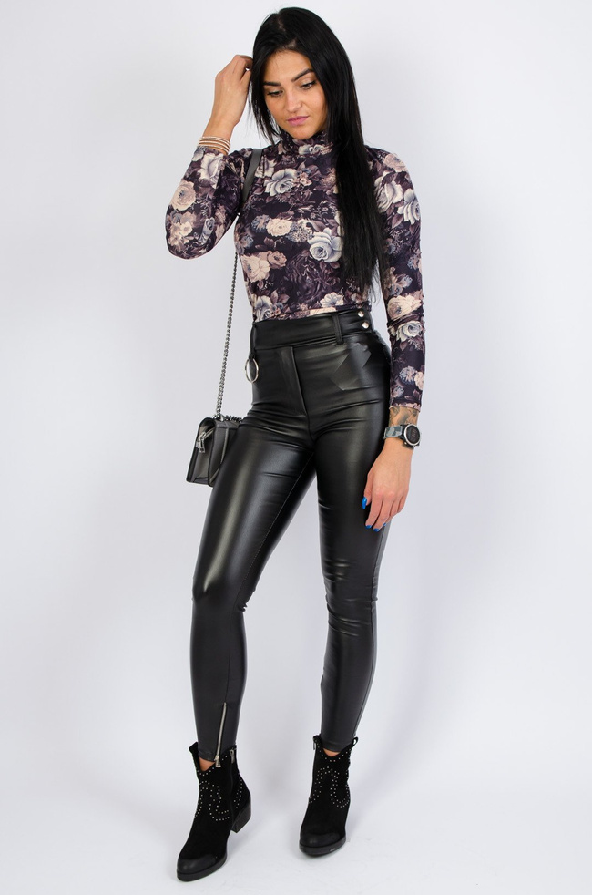 Czarne woskowane spodnie z zamkami na dole nogawki