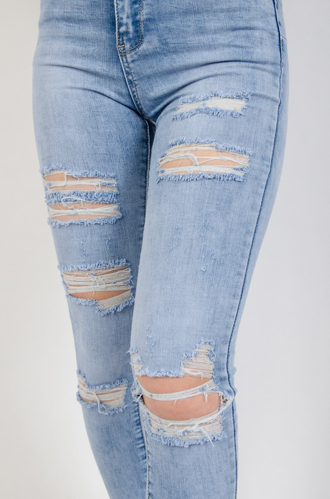 Jasne spodnie jeansowe Push Up z dziurami