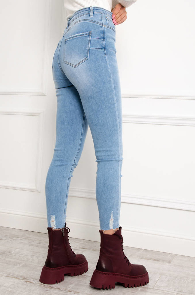 SPODNIE JEANSOWE Z SZARPANIEM PRZY NOGAWCE- WYSOKI STAN