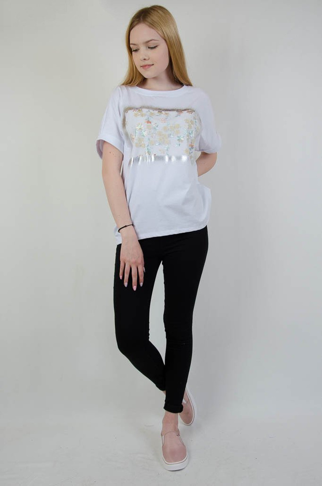 Biała asymetryczna bluzka z kwiatkami oraz wiązaniem na plecach