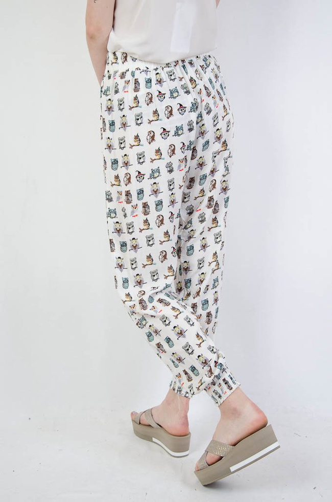 Białe spodnie alladynki w sowy