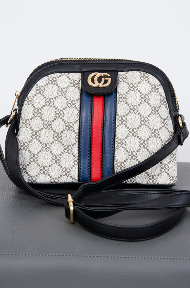 Wzorzysta torebka z czerwono-granatowym paskiem na przodzie