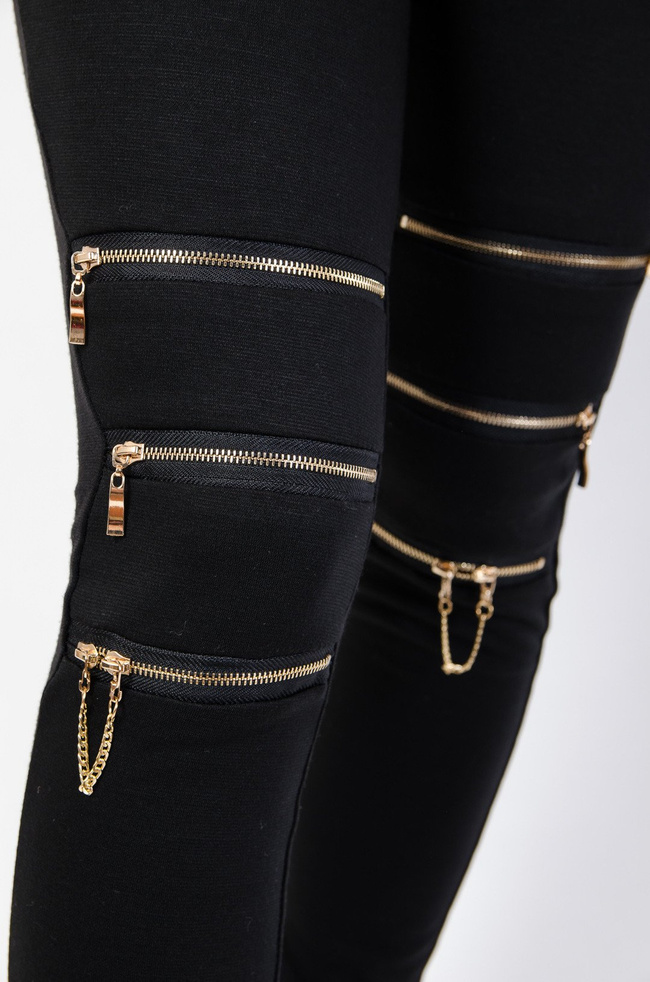 Czarne spodnie legginsy z zamkami na nogawkach