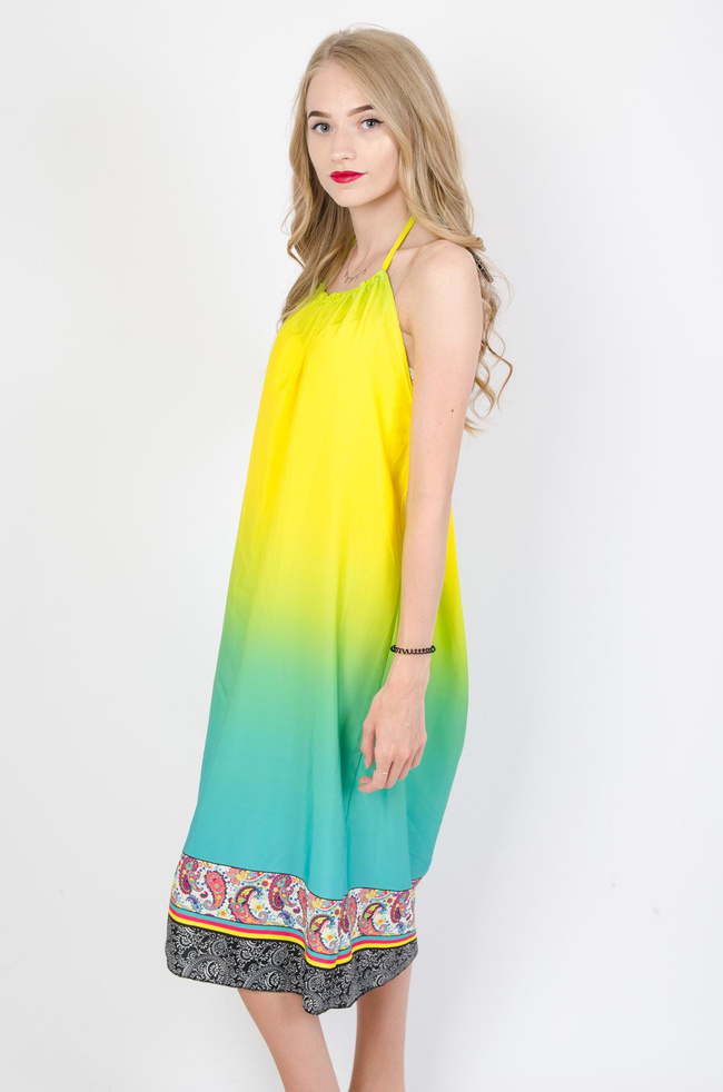 Kolorowa sukienka z wiązaniem na szyi oraz odkrytymi plecami