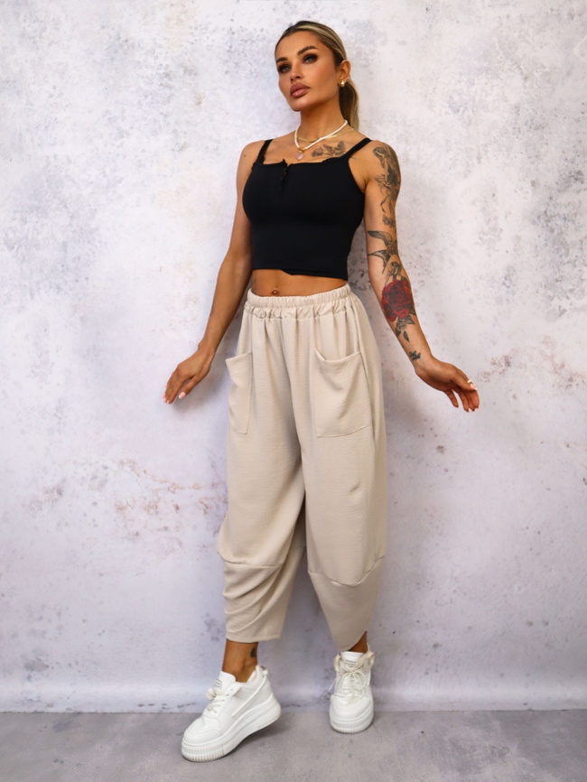 SPODNIE MATERIAŁOWE O LUŹNYM KROJU- BEŻOWE