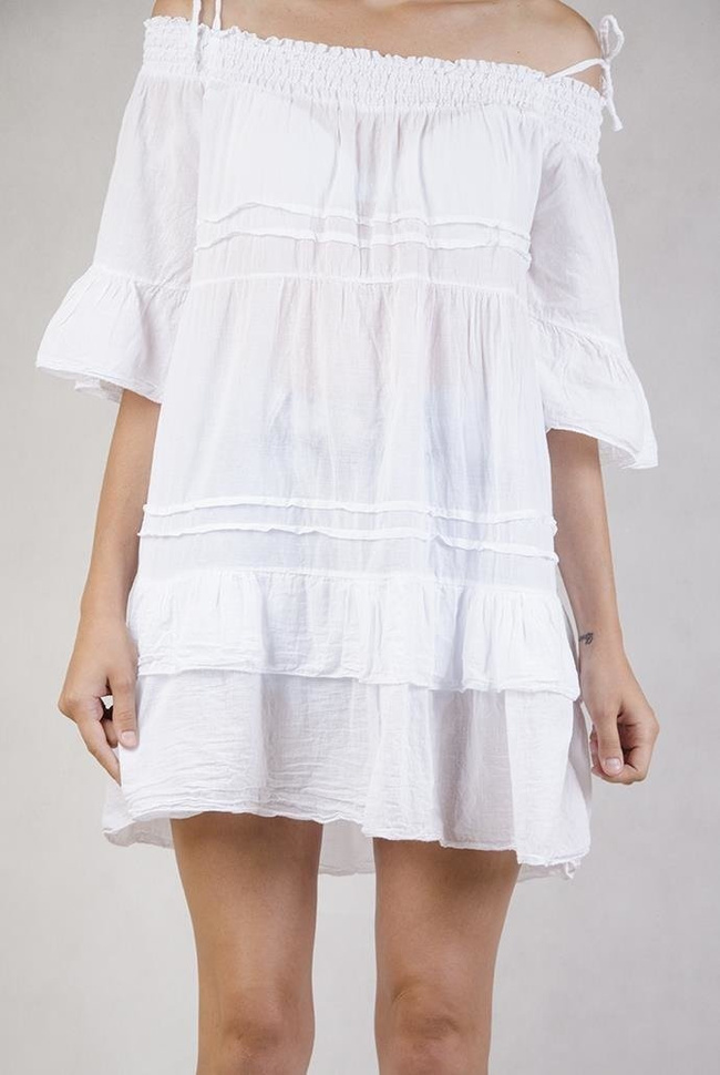Biała tunika z falbanami i hiszpańskim dekoltem