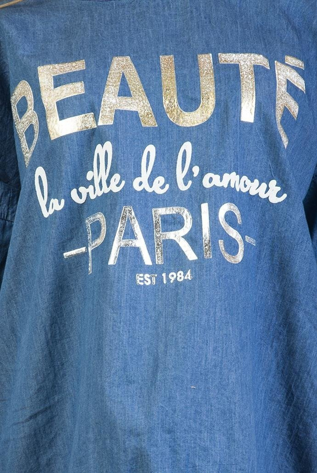 Jasno niebieska, asymetryczna bluzka jeansowa