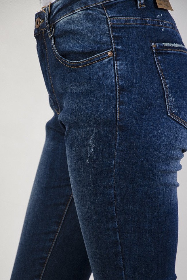 ( Rozmiary L-4 XL ) Spodnie jeansowe z wysokim stanem oraz delikatnymi przetarciami