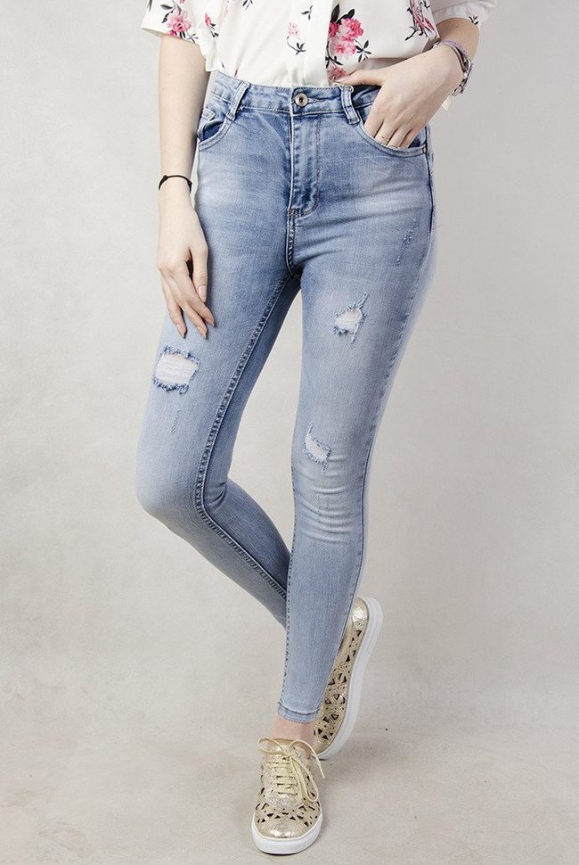 Jasne spodnie jeansowe typu push up z dziurami