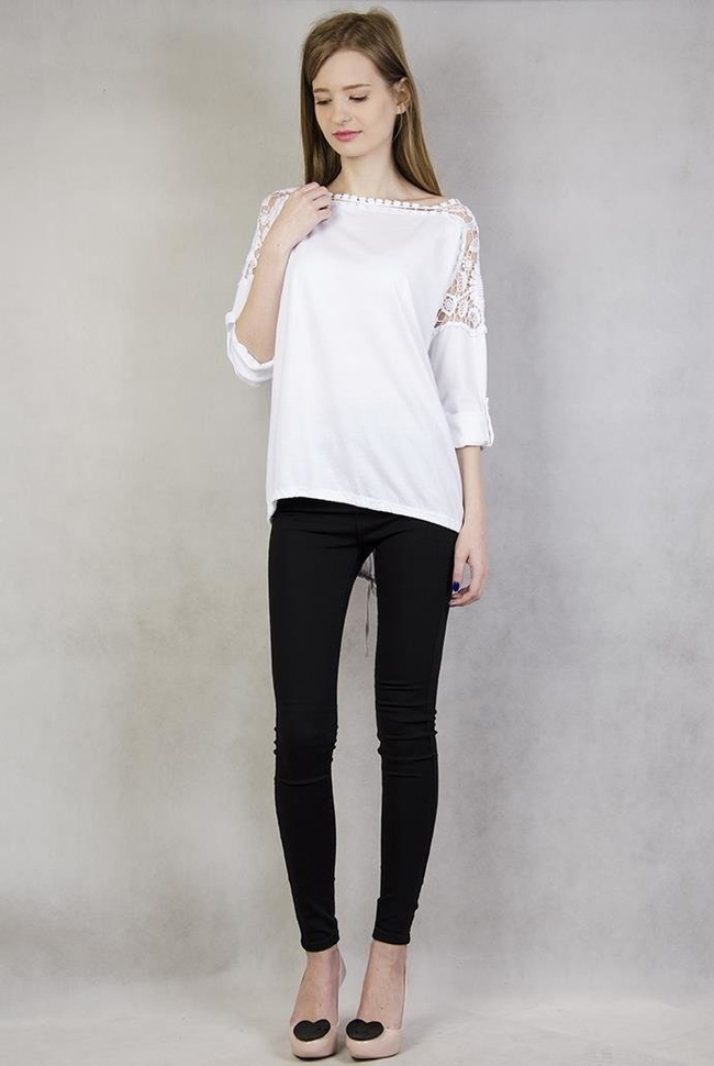 Biała, asymetryczna bluzka z ozdobnym haftem na ramionach