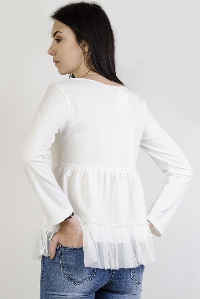 Biała bluzka z falbankami na dole