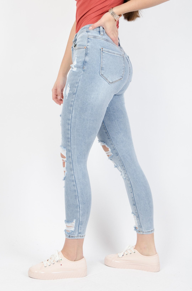 Jasne spodnie jeansowe z przetarciami-wysoki stan