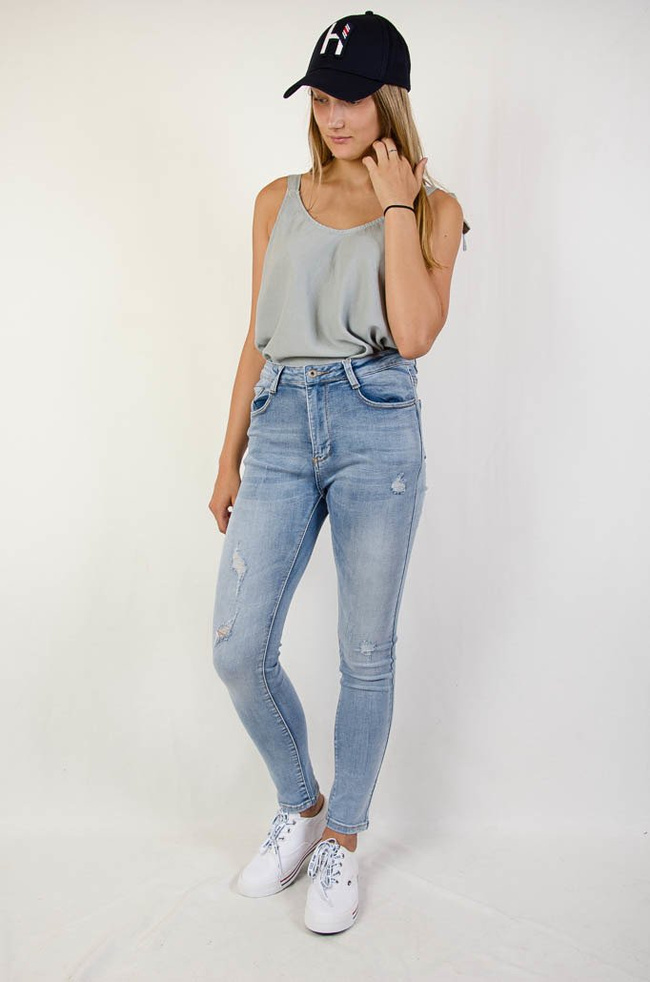 (Duże rozmiary L-XXXXL) Spodnie jeansowe z przetarciami