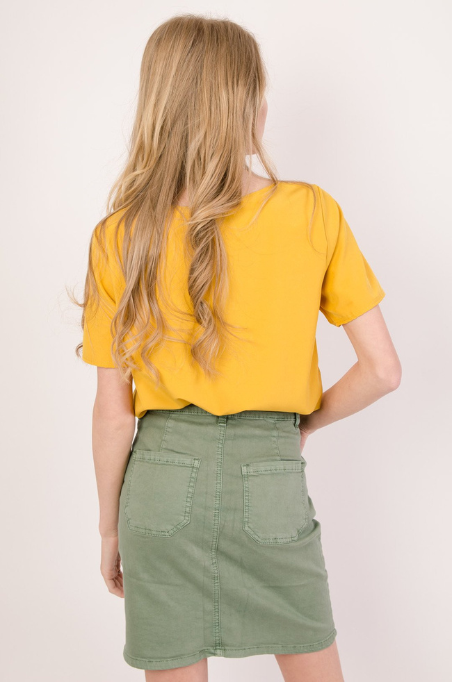 Żółta bluzka z zakładką oraz gumką na dole