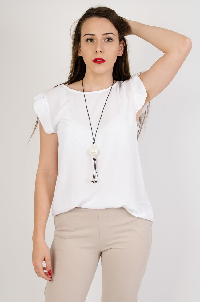 Biała bluzka z guzikami na plecach