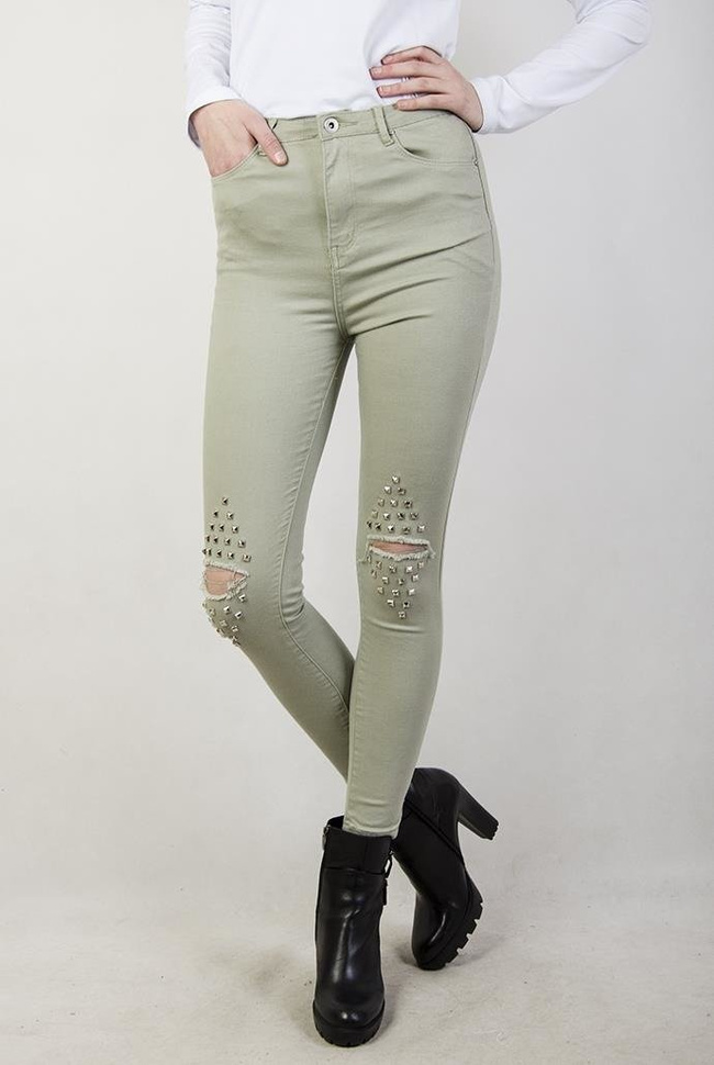 Jasnozielone spodnie skinny jeans z ćwiekami i dziurami