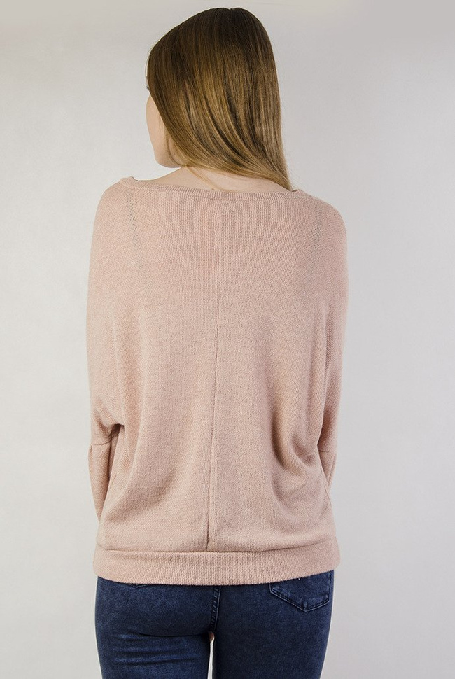 Jasnoróżowy sweterek z bufiastymi rękawami oraz perełkami