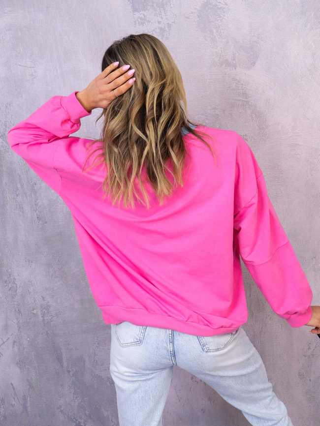 ASYMETRYCZNA BLUZA OVERSIZE Z PRZESZYCIAMI NA RĘKAWACH- FUKSJA