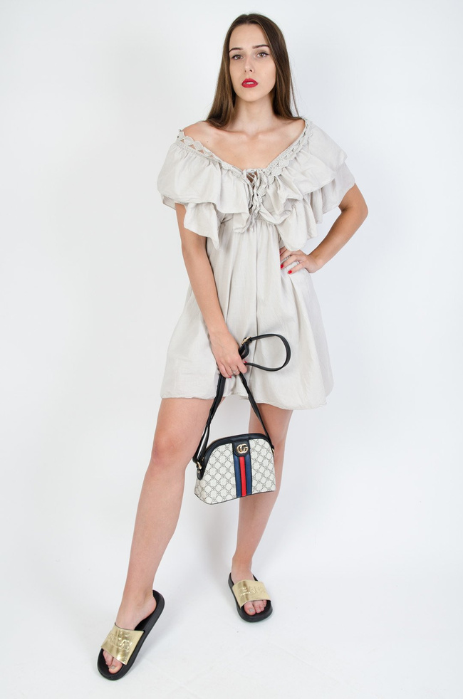 Wzorzysta torebka z czerwono-granatowym paskiem na przodzie