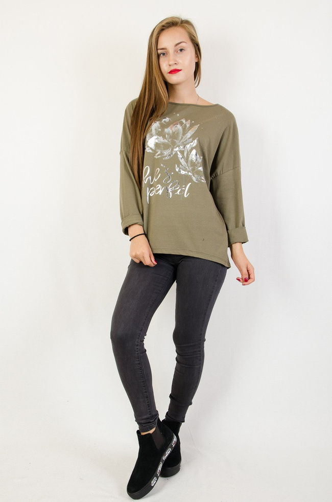 Zielona asymetryczna bluzka typu oversize z aplikacją z przodu