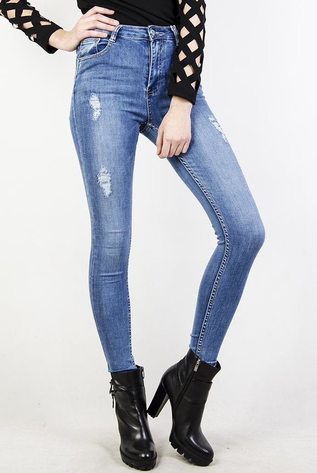Jeansowe spodnie skinny jeans z przetarciami oraz wysokim stanem