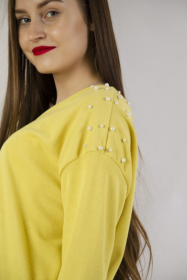 Żółta asymetryczna tunika z perełkami oraz wycięciem na plecach