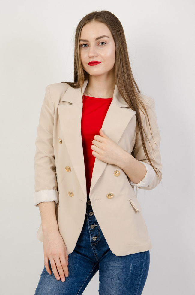 Beżowa marynarka z rzędem złotych guzików