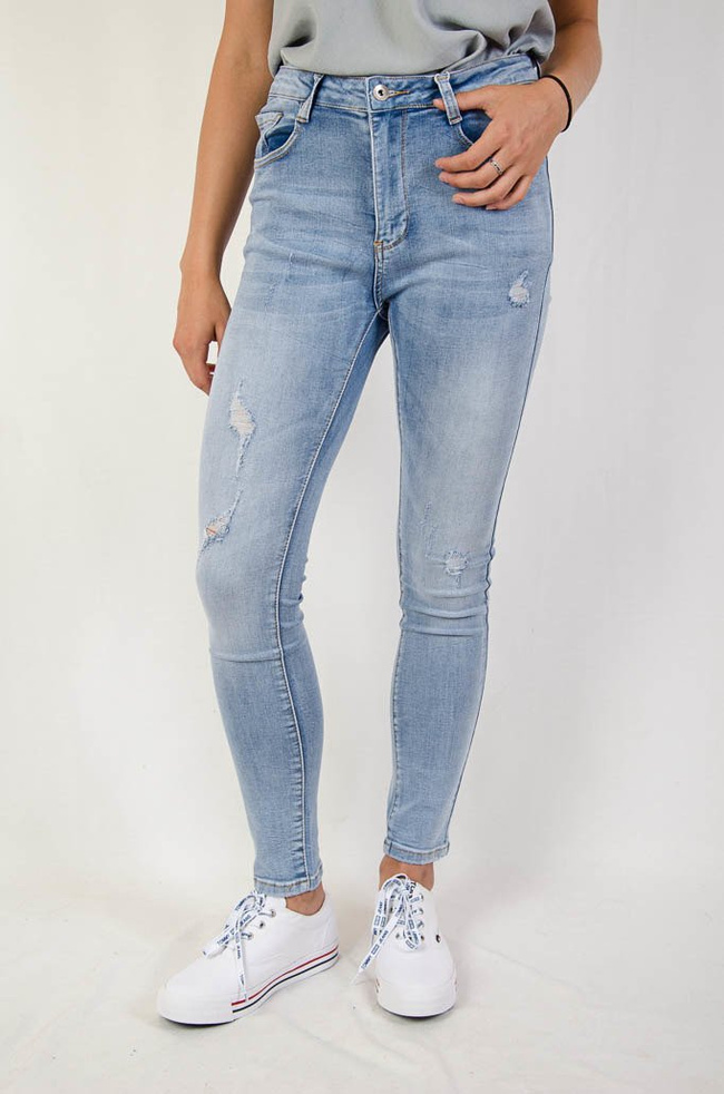 (Duże rozmiary L-XXXXL) Spodnie jeansowe z przetarciami