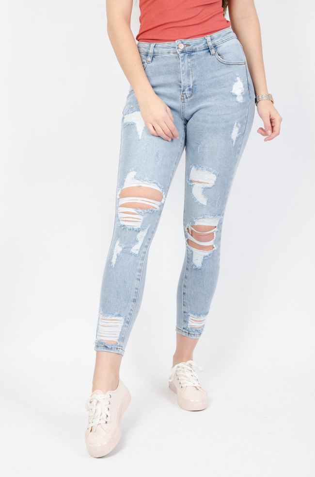 Jasne spodnie jeansowe z przetarciami-wysoki stan