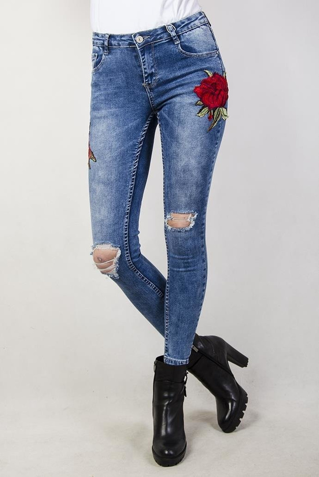 Spodnie jeansowe z naszywkami różami i wysokim stanem