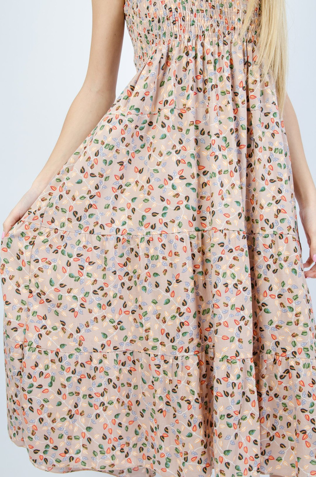 BEŻOWA SUKIENKA BEZ RĘKAWÓW WIĄZANA NA SZYI