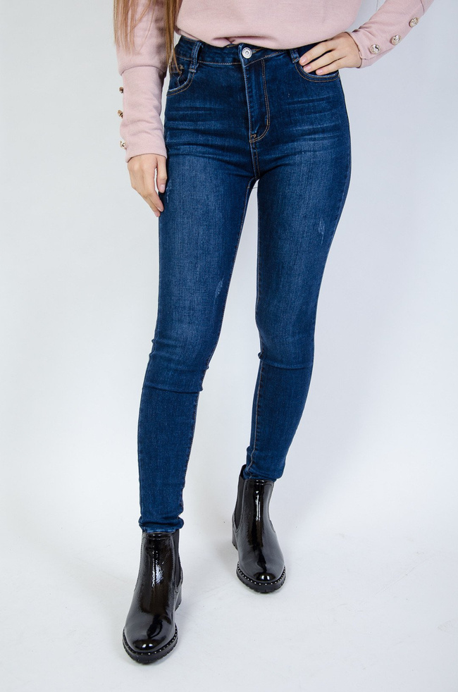 Jeansowe przylegające spodnie z przetarciami