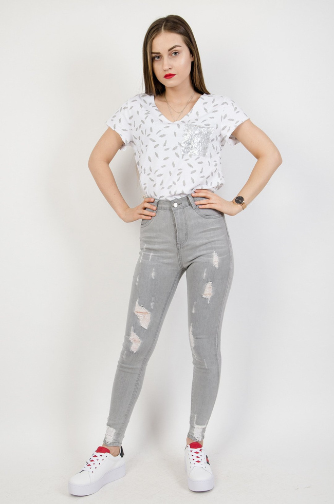 Jasno szare spodnie jeansowe z przetarciami