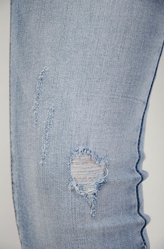 (Duże rozmiary L-XXXXL) Spodnie jeansowe z przetarciami