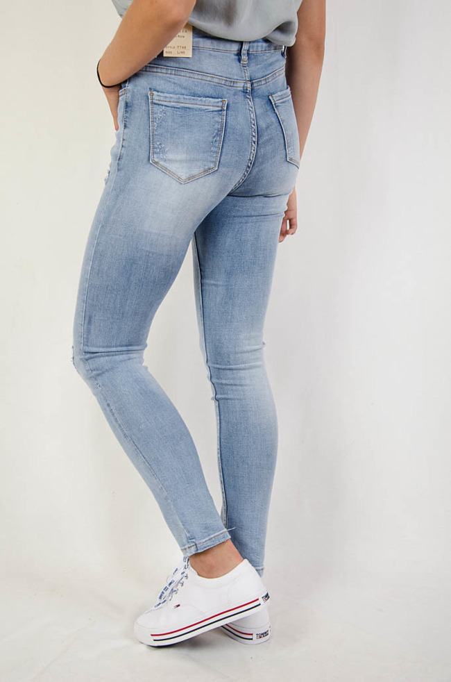(Duże rozmiary L-XXXXL) Spodnie jeansowe z przetarciami