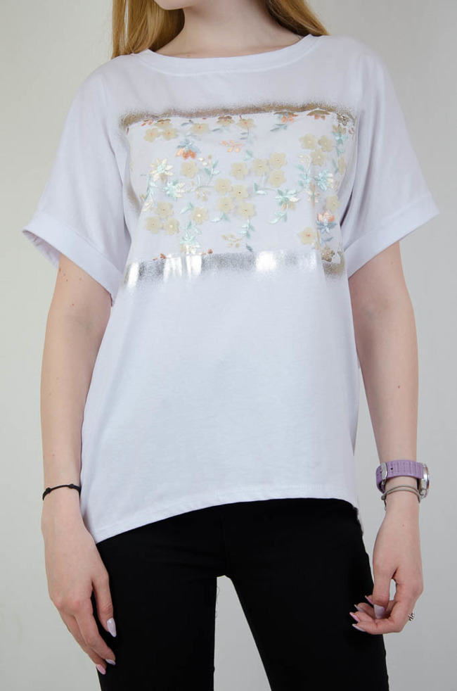 Biała asymetryczna bluzka z kwiatkami oraz wiązaniem na plecach