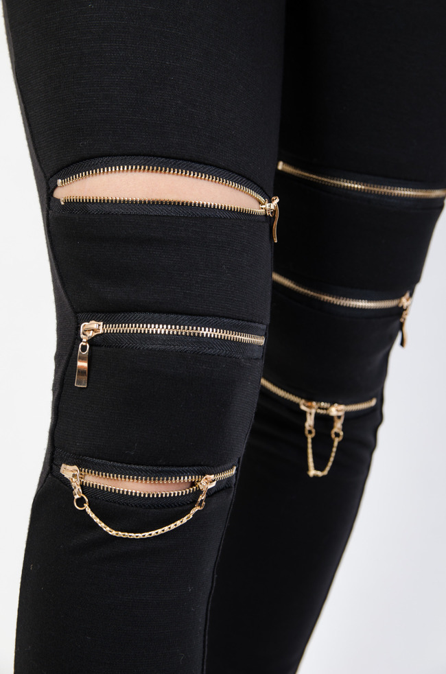 Czarne spodnie legginsy z zamkami na nogawkach