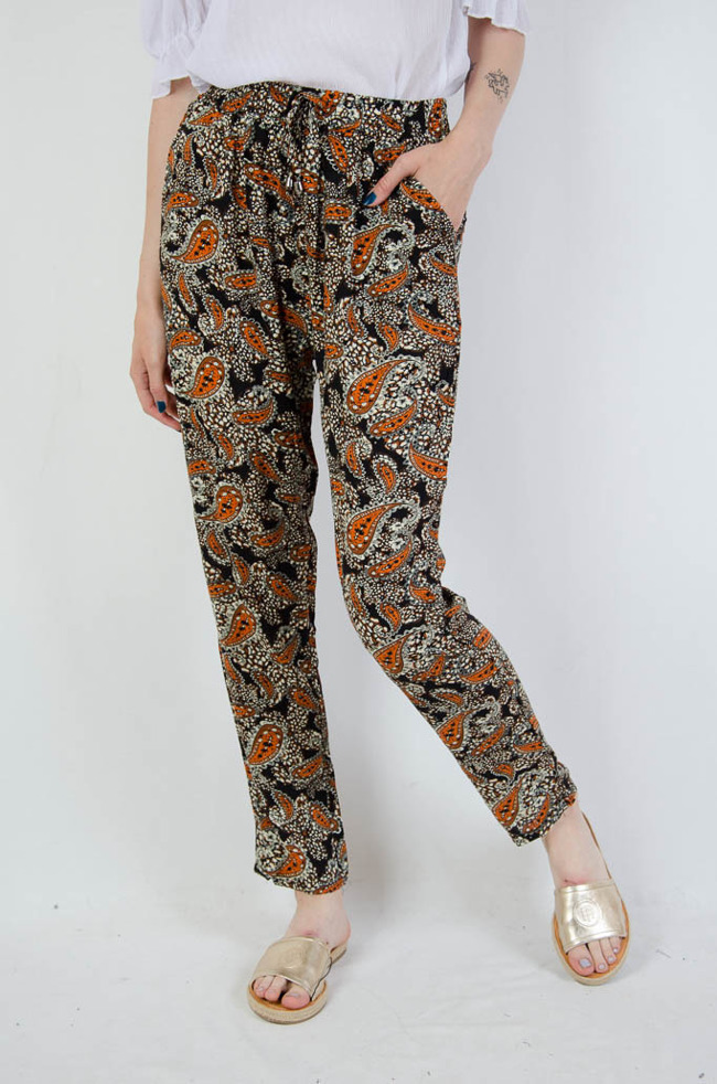 Długie spodnie alladynki w pomarańczowe wzory