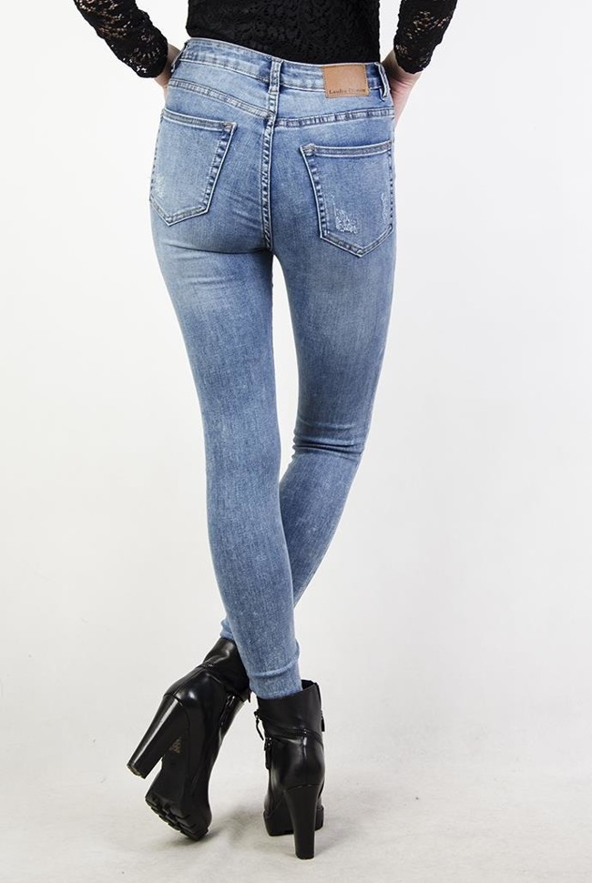 Przylegające spodnie jeansowe rurki z wysokim stanem