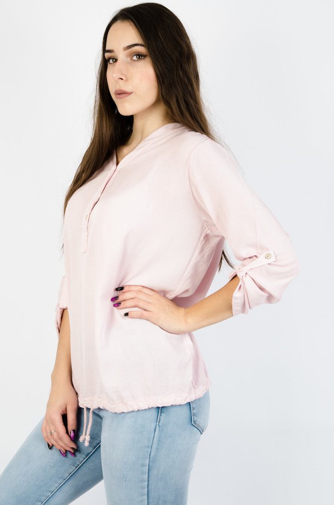 Różowa bluzka oversize z wiązaniem na dole