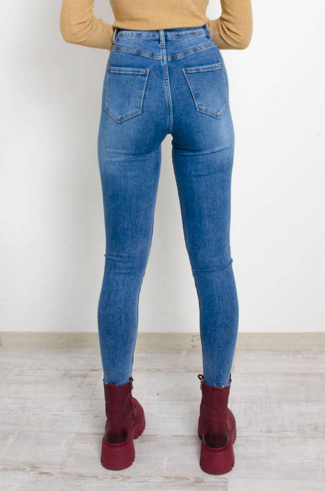 SPODNIE JEANSOWE SKINNY Z PRZETARCIAMI 