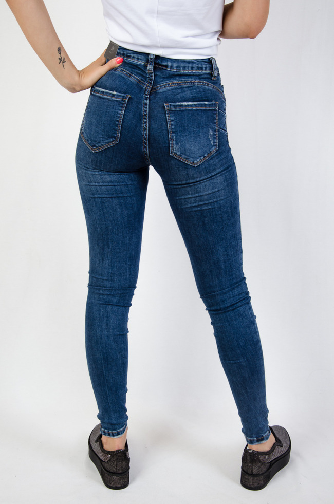 Spodnie jeansowe tupu push up z delikatnymi przetarciami
